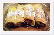 egg-pancakes * Egg Pancakes (Blintz) -  Rolled thin with grape jam, and topped with powdered sugar. * 750 x 448 * (74KB)