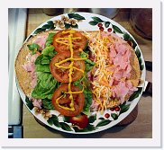 flatbread-wrap * Flat Bread Wrap - Before folding to show off the ingredients. Krakus Polish Ham, deli shaved on tomato pita bread. * 750 x 682 * (93KB)