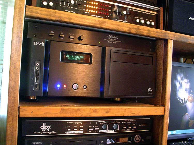 htpc.jpg - The digital heart of the system is a Bach Media HTPC running Windows 8 and jRiver Media Center. It's also set up to dual boot to Windows XP for vinyl rips, as it's just a lot easier to do it that way than upgrade and reinstall all the software needed for that. Recently gutted and updated to a current generation board and chipset which runs absolutely quiet and cool, unlike the old system that could cook eggs on a hot August day, even with six fans running.